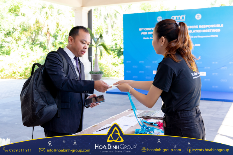 HoaBinh Group personnel support delegate check-in